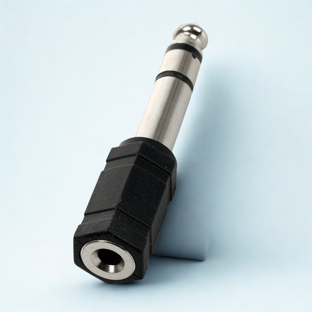 ADAPTADOR JACK 3.5MM STEREO  A PLUG 6.35MM STEREO PLASTICO